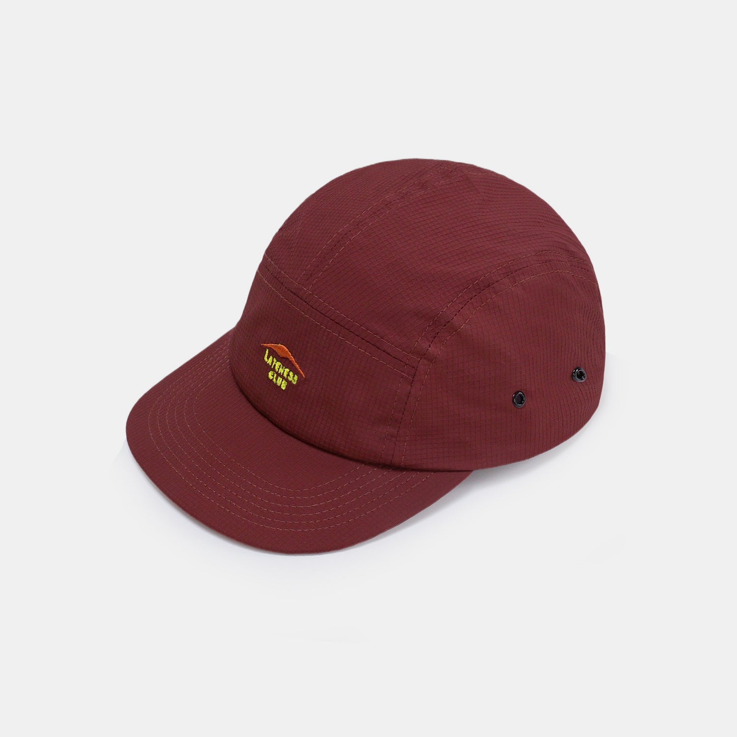 Burgundy five-panel baseball cap shown from front, side and angled views, featuring a small embroidered mountain logo and side ventilation eyelets.