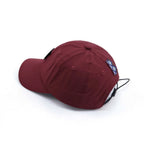 Adjustable baseball cap in burgundy, rear view with an elastic drawcord, geometric side patch and panel stitching
