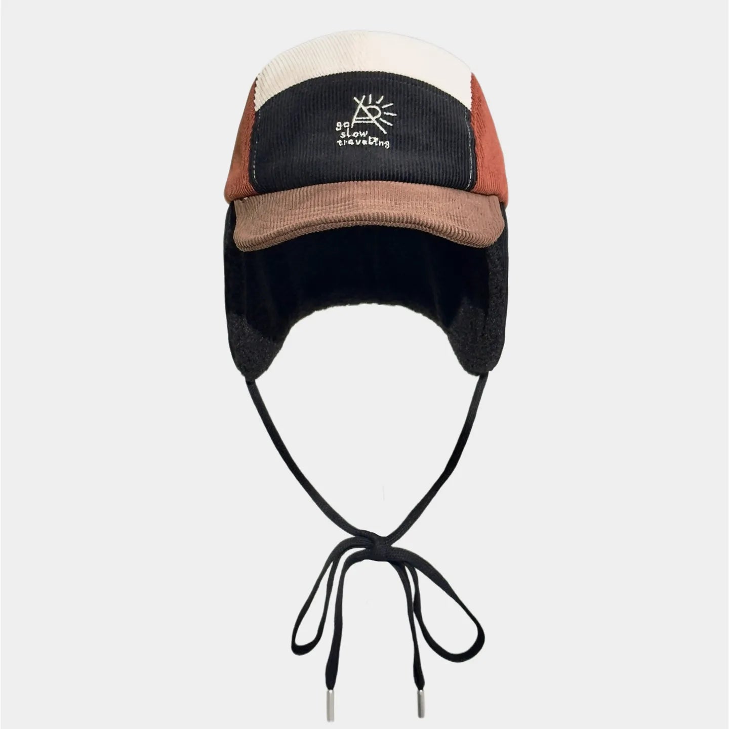 Adjustable corduroy ear flap cap with versatile wearing options and cosy winter construction