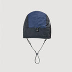 Adjustable nylon winter cap showing rear fastening system and stitched panel details