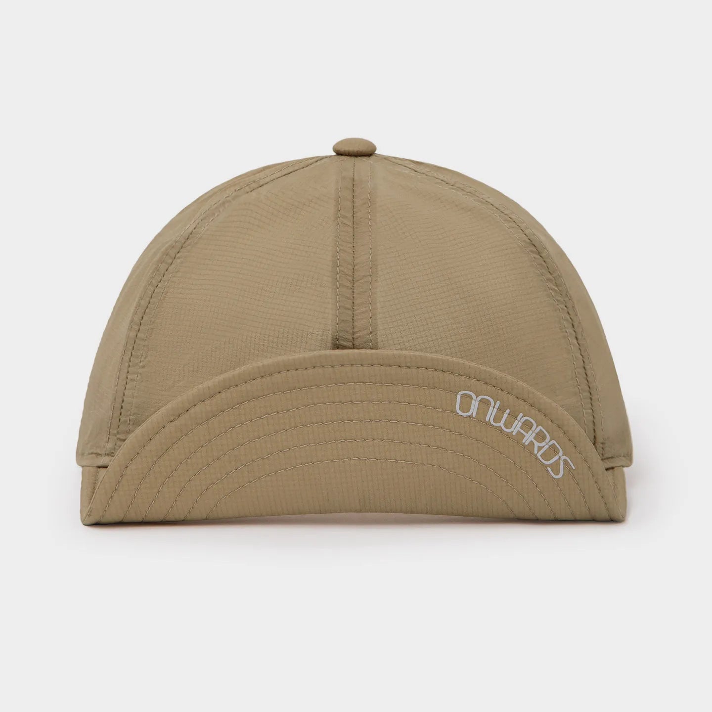 Beige nylon 5 panel cap with minimalist low profile design and curved brim