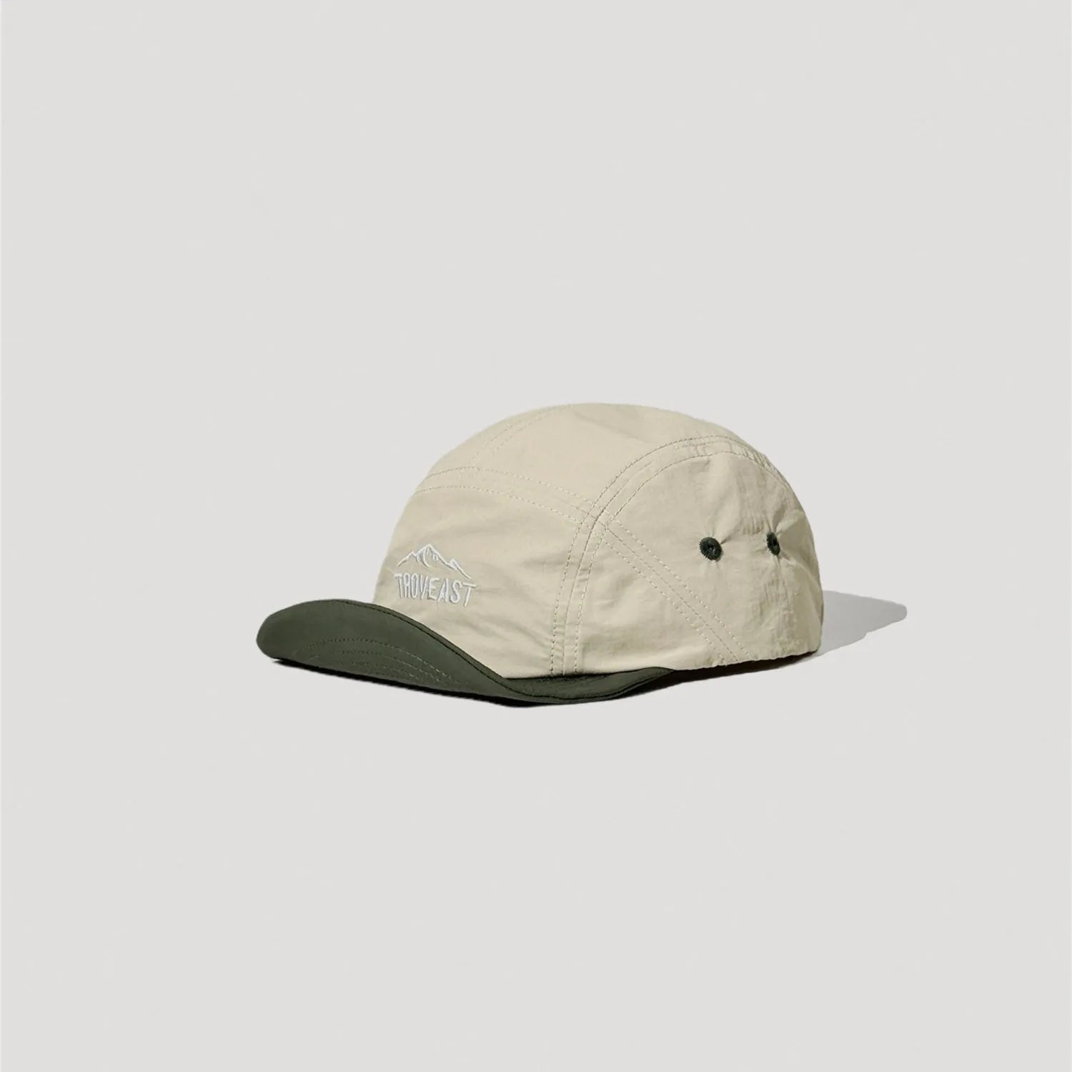 Lightweight nylon camp cap featuring curved brim and clean stitched construction