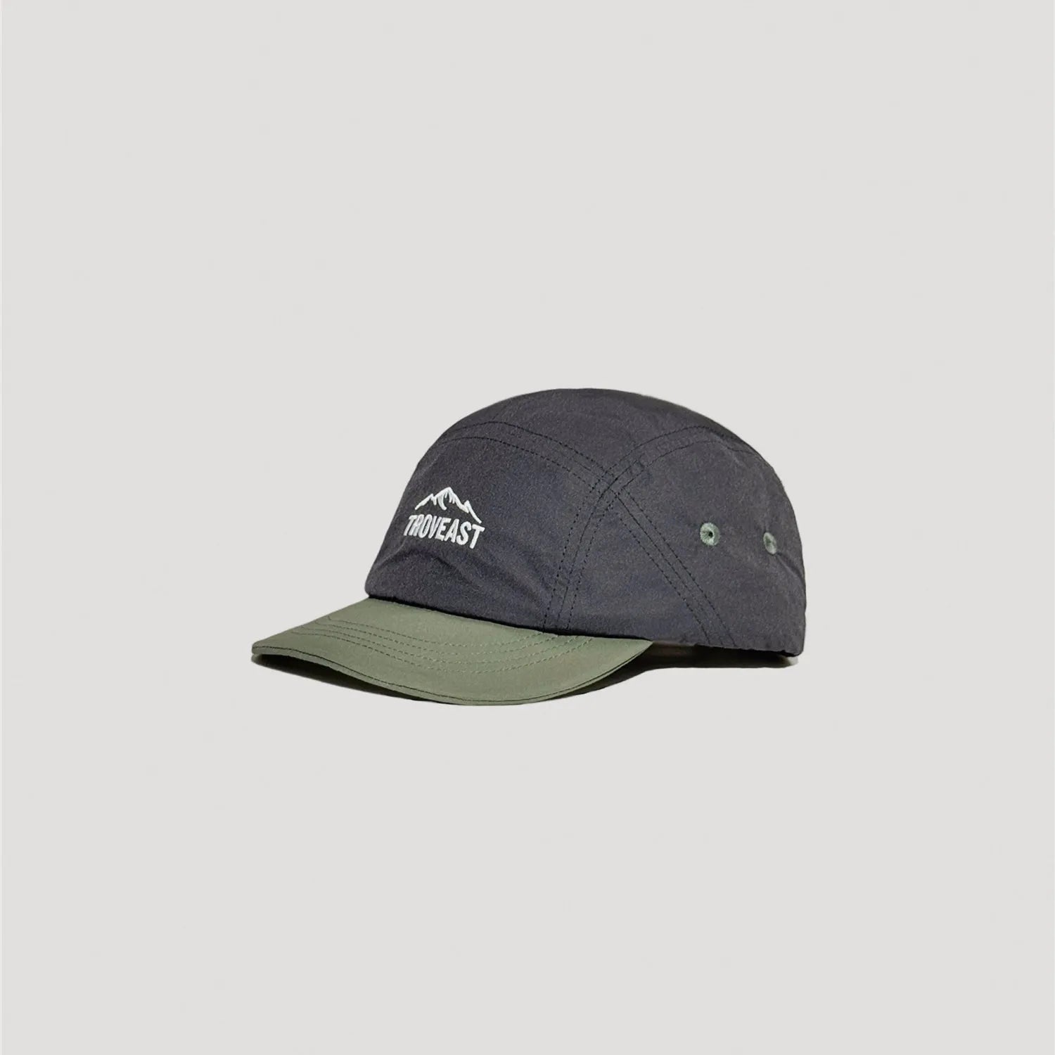 Lightweight nylon camp cap featuring curved brim and clean stitched construction