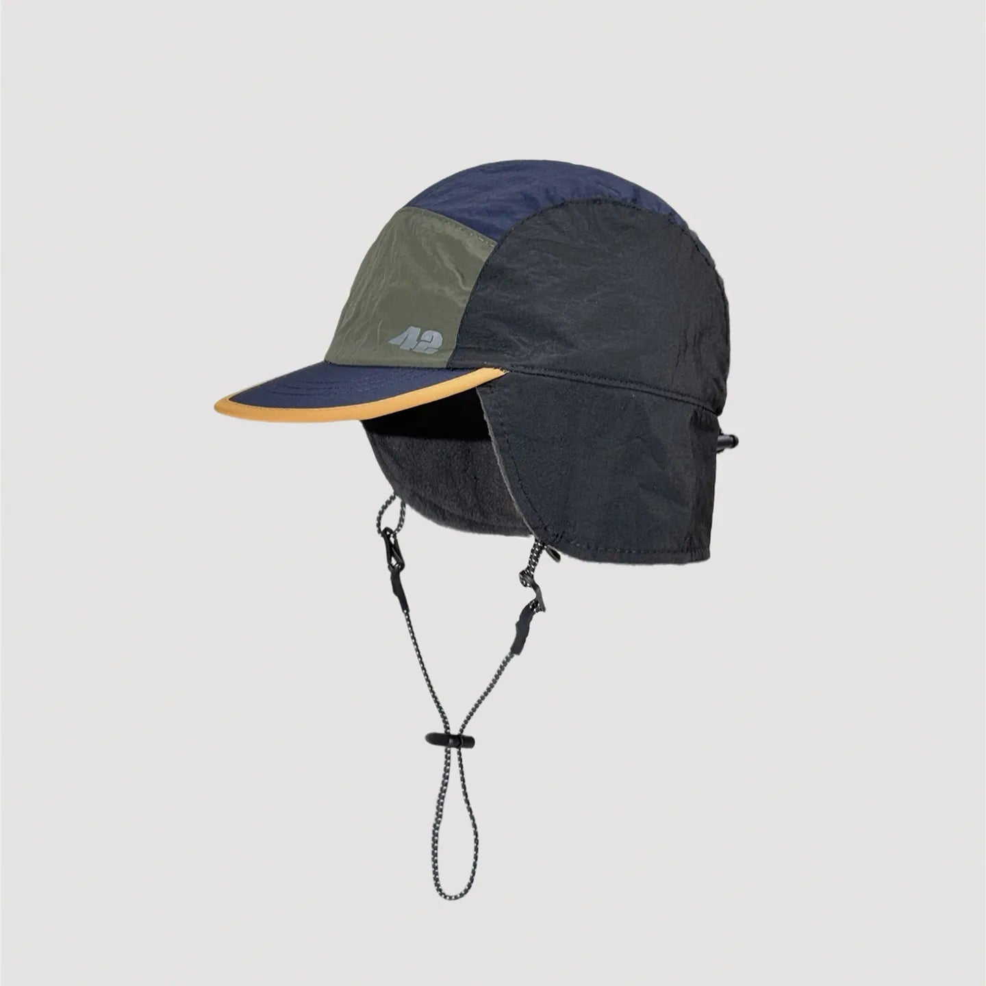 Technical nylon winter hat with reflective logo detail and outdoor inspired style