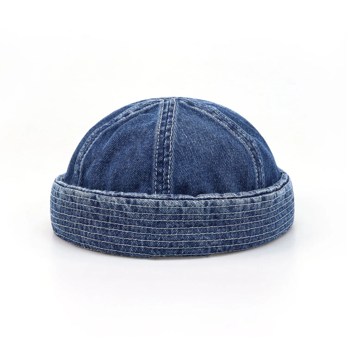 Denim docker cap in washed indigo blue, front view with a rounded low crown and broad cuff finished in parallel stitching