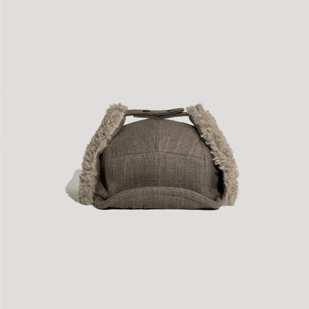 Brown cotton linen aviator hat with sherpa ear flap lining and vintage winter style