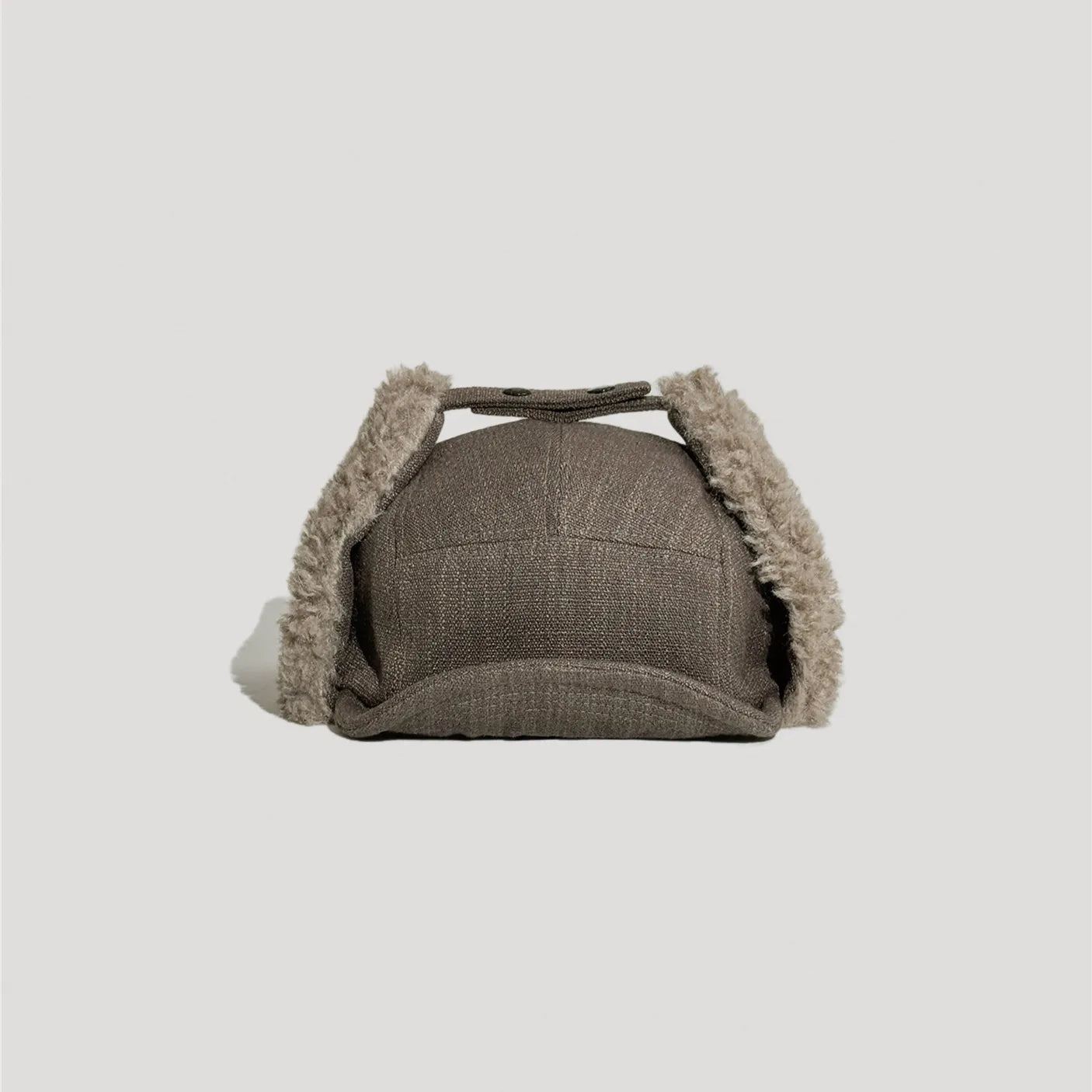 Brown cotton linen aviator hat with sherpa ear flap lining and vintage winter style