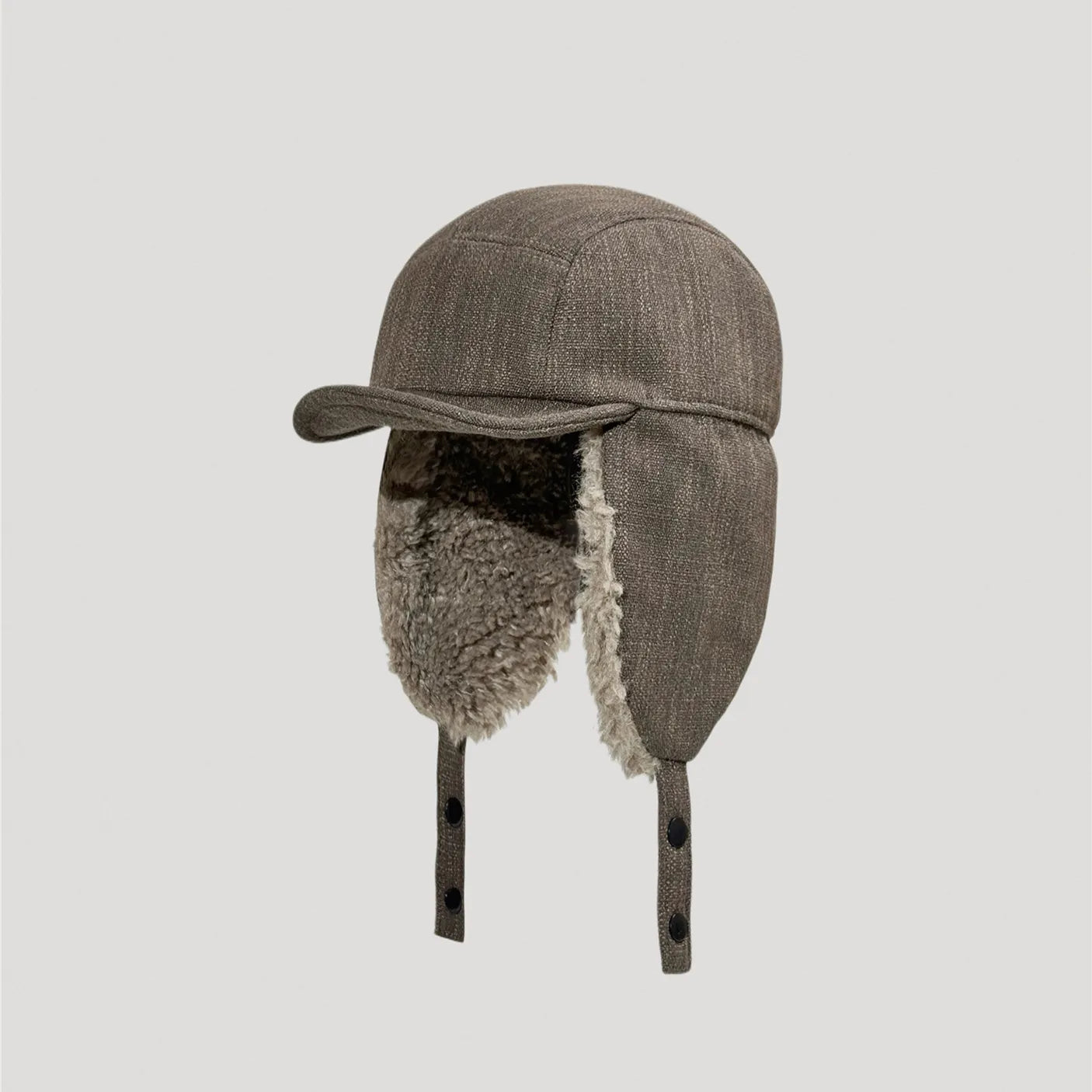 Brown cotton linen sherpa lined trapper hat with ear flaps and short brim winter design