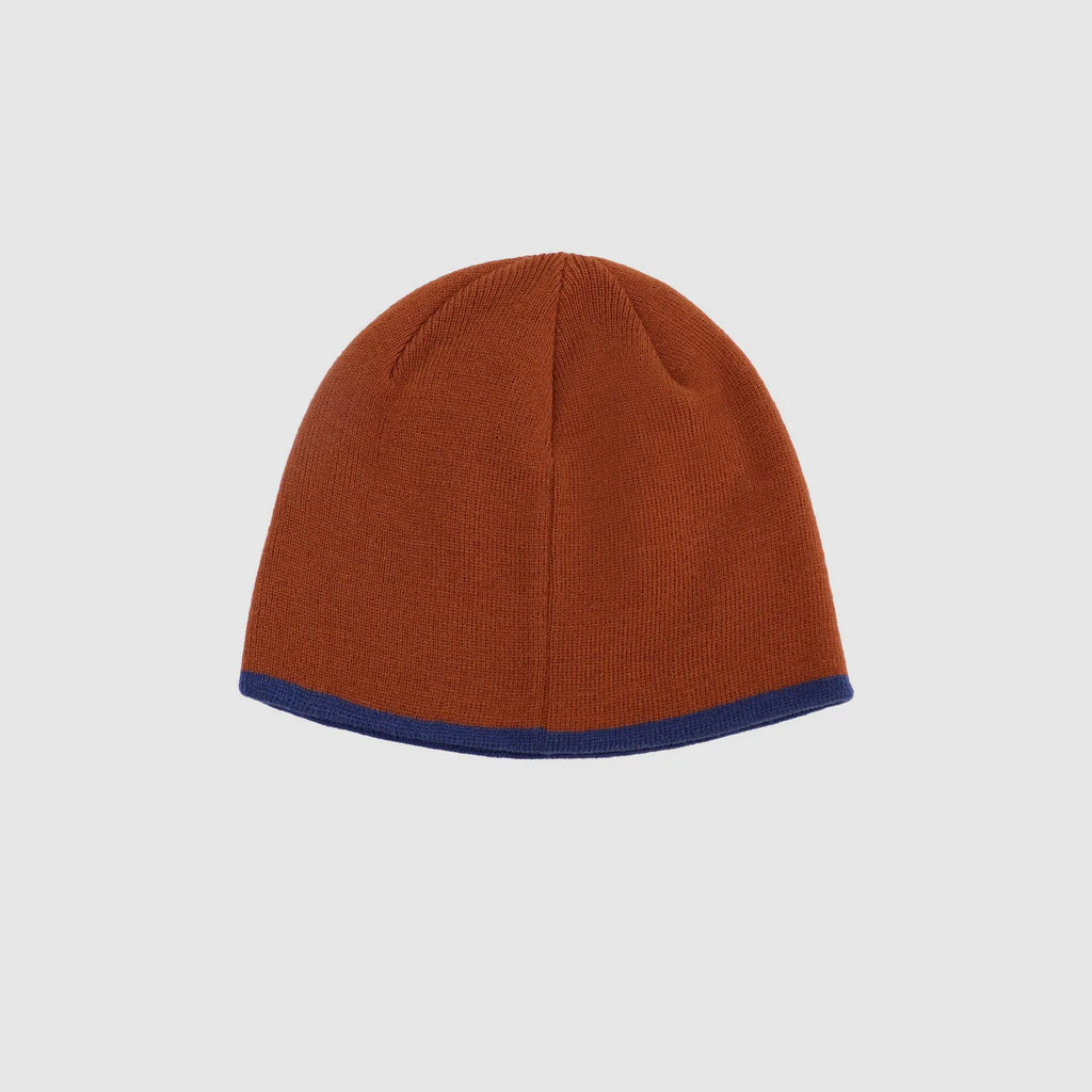 Brown acrylic knit winter beanie with contrast blue trim and classic fitted shape
