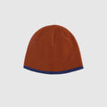 Brown acrylic knit winter beanie with contrast blue trim and classic fitted shape