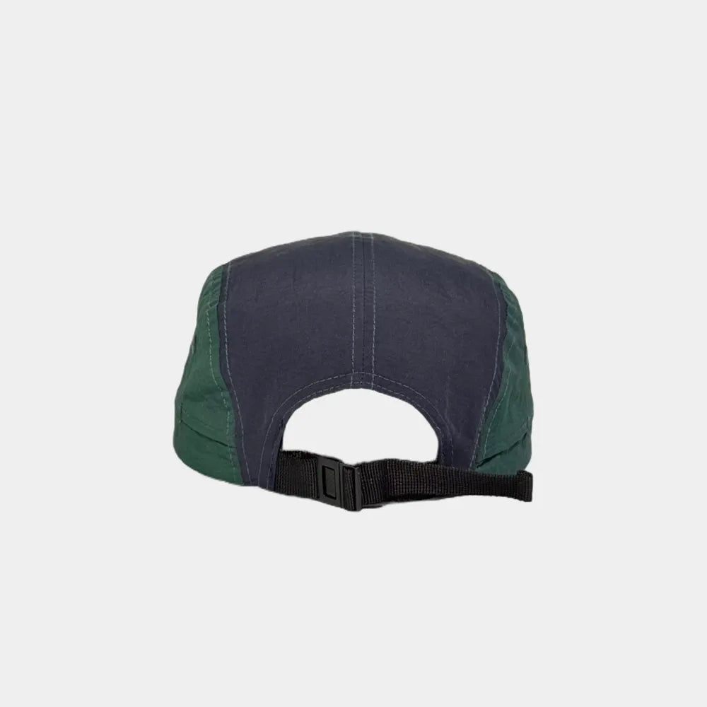 Colour block five panel cap in navy and forest green, rear view with an open back and black webbing buckle