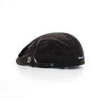 Cotton corduroy flat cap in dark brown, side view with a short peak, smile embroidery and side snap adjuster
