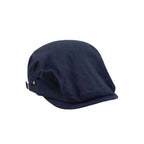 Cotton ivy cap in navy, front angle showing the soft low-profile crown, short peak and tonal herringbone texture