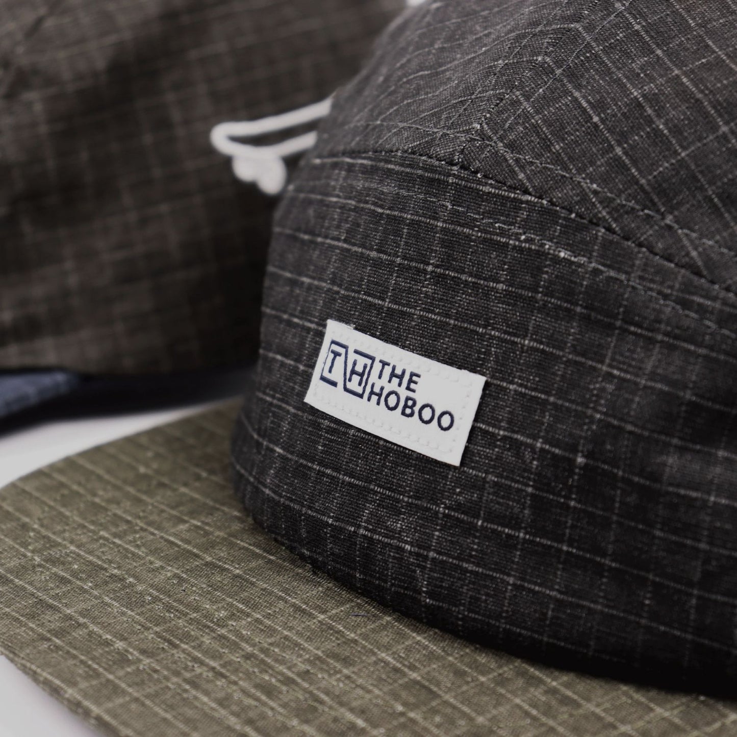 Casquette à 5 panneaux avec motif à carreaux