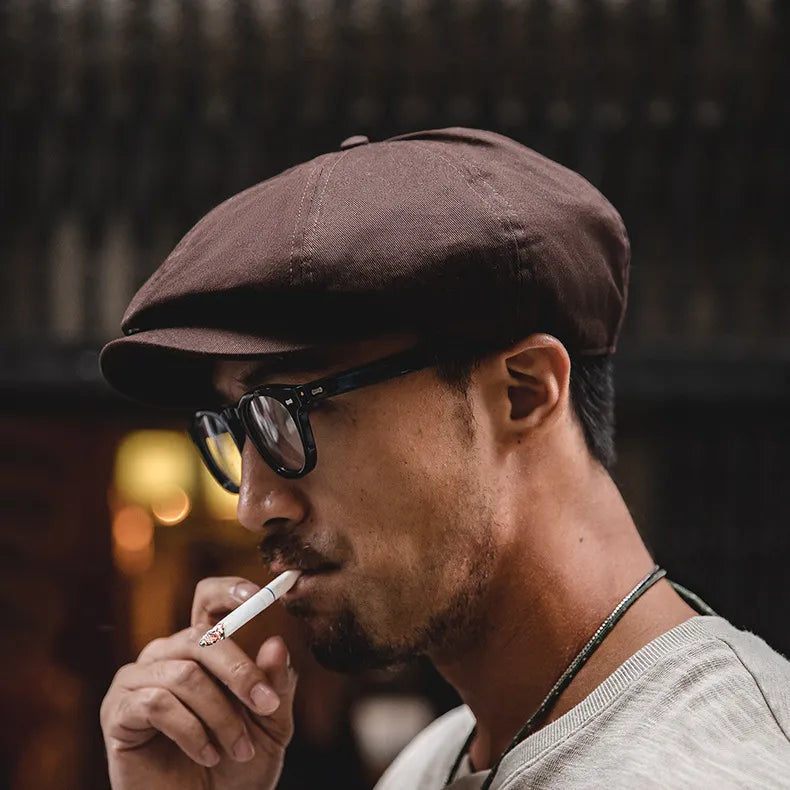 Eight panel newsboy cap design with structured rounded crown detail