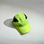 Black mesh panel sports cap designed with enhanced ventilation and modern athletic style