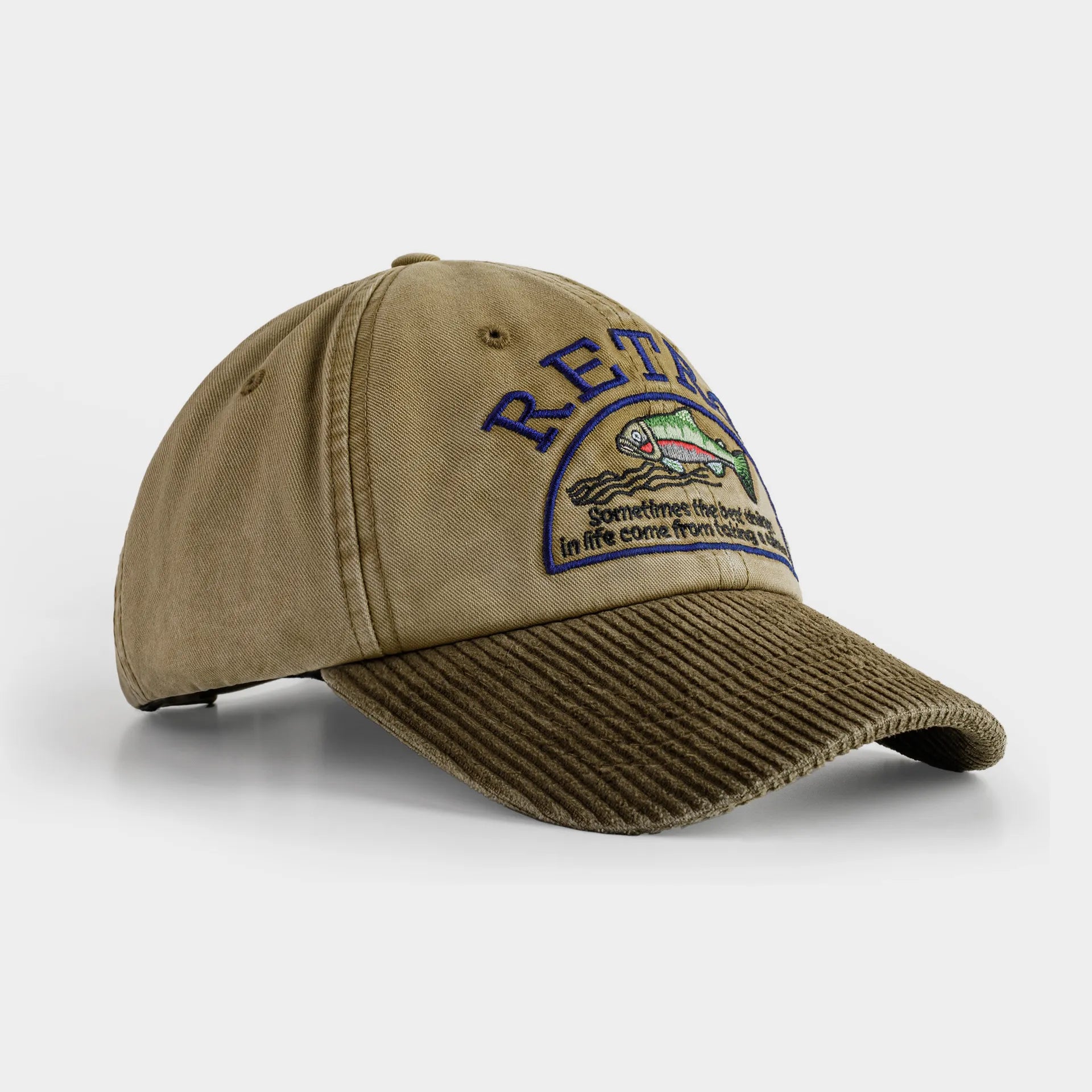 Three-quarter product view of a khaki cotton baseball cap with fish embroidery and an olive corduroy curved brim