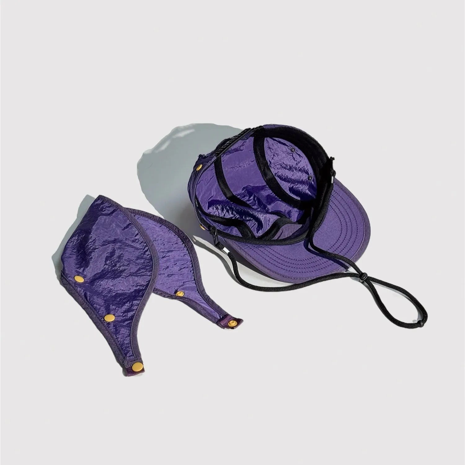 Inner construction of nylon outdoor cap showing lightweight fabric structure and adjustable fit