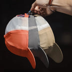 Lightweight nylon hiking cap featuring five panel construction and modern outdoor style