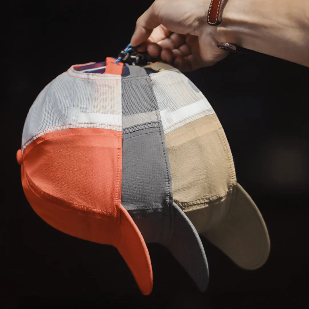 Lightweight nylon hiking cap featuring five panel construction and modern outdoor style