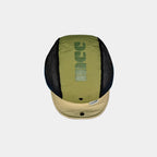 Mesh cycling cap in olive green, top view showing crinkled nylon, a beige peak, press studs and a printed crown graphic.