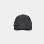 Minimalist nylon baseball cap in black, front view with a plain crown and curved multi-row stitched brim