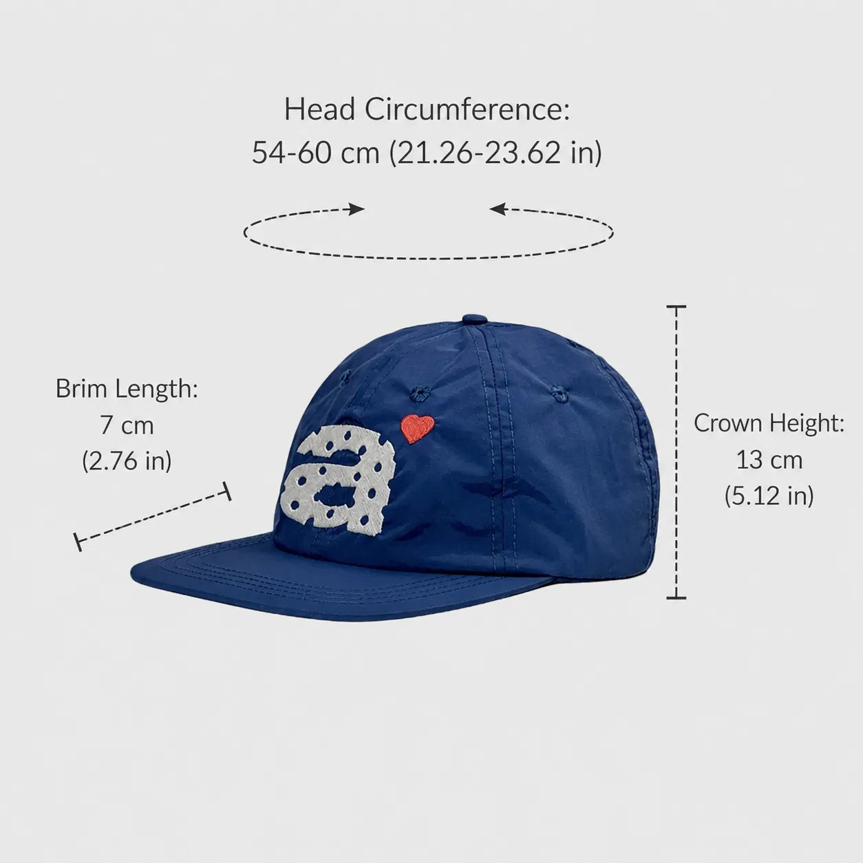 Navy nylon 5 panel cap side view with flat brim and embroidered graphic detail