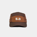 Nylon five panel cap in dark brown, burnt orange and chestnut, front view with a woven logo patch and curved stitched peak