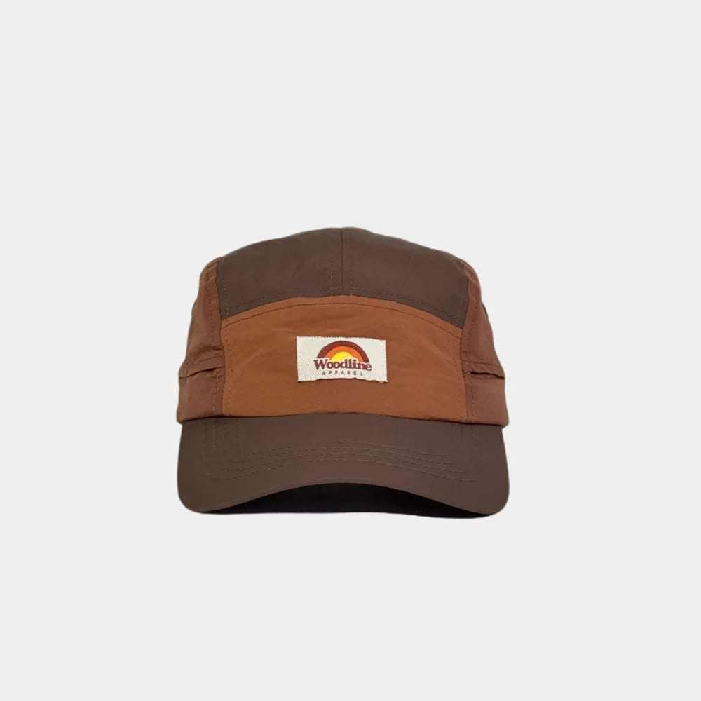 Nylon five panel cap in dark brown, burnt orange and chestnut, front view with a woven logo patch and curved stitched peak