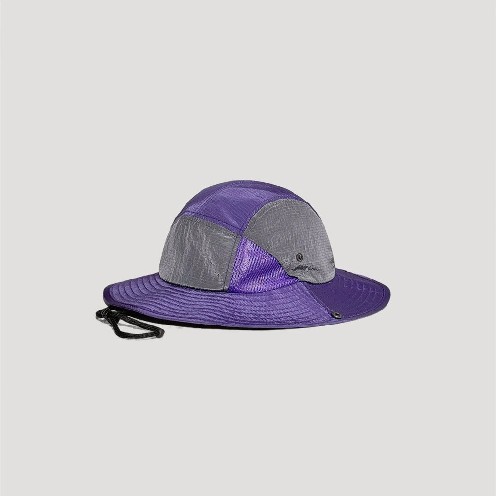 Purple nylon wide brim bucket hat back view with adjustable chin cord detail