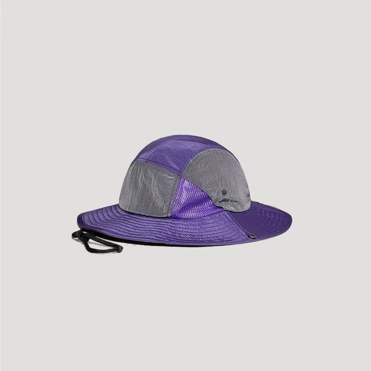 Purple nylon wide brim bucket hat back view with adjustable chin cord detail