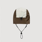 Adjustable nylon winter cap showing rear fastening system and stitched panel details