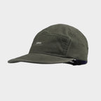 Olive green cotton 5 panel cap with a small front logo, stitched panel construction, curved brim and side eyelet
