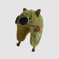 Olive green ear flap hat with black goggles, cat ears, plush inner panels and decorative badges on the side.