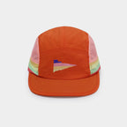 Front view of an orange lightweight nylon five-panel cap with a multicolour geometric graphic and short stitched brim.