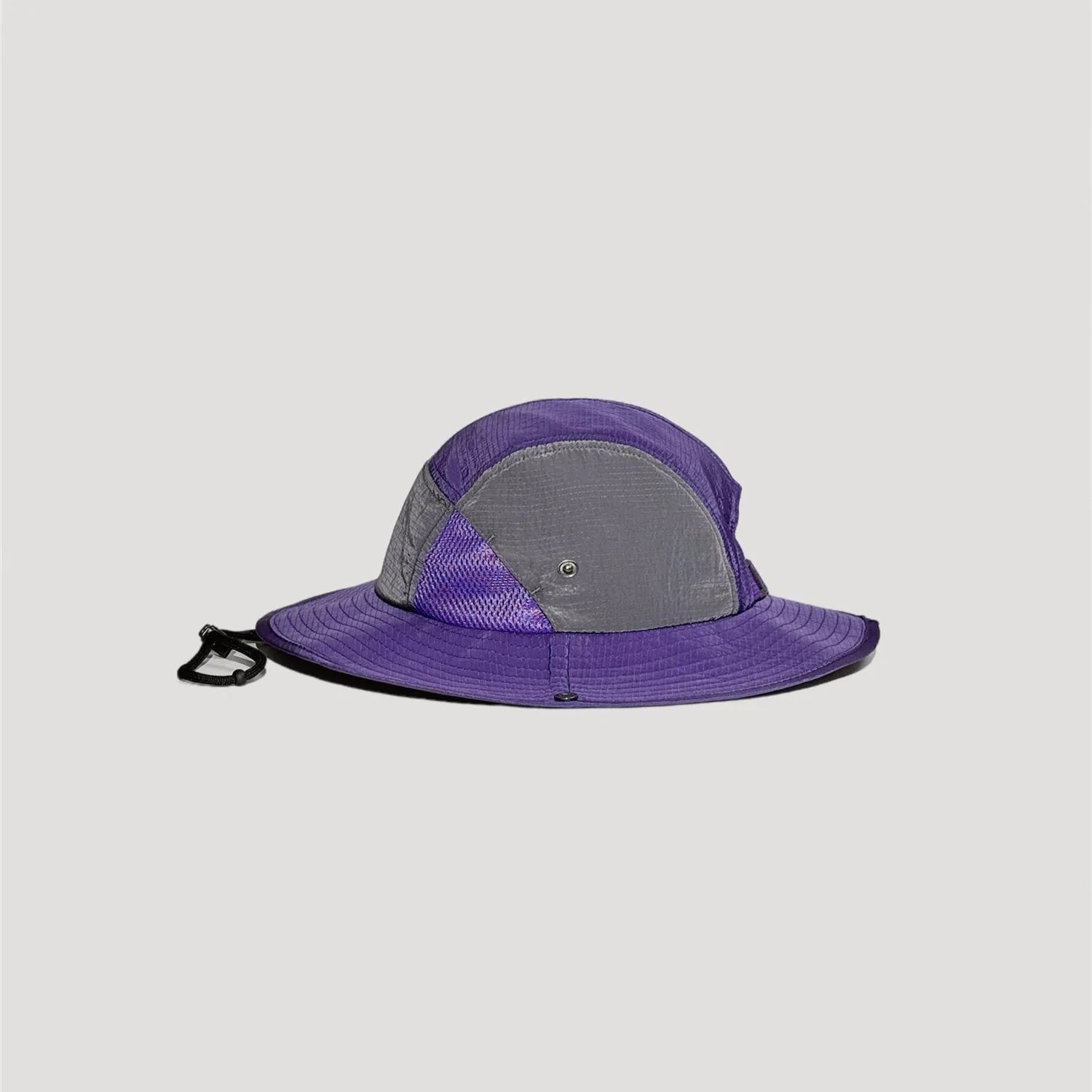 Nylon outdoor bucket hat side profile with wide brim and colour block panel design