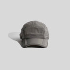 Quick-dry 5-panel cap in light grey, front view showing the low crown, crinkled finish and curved peak