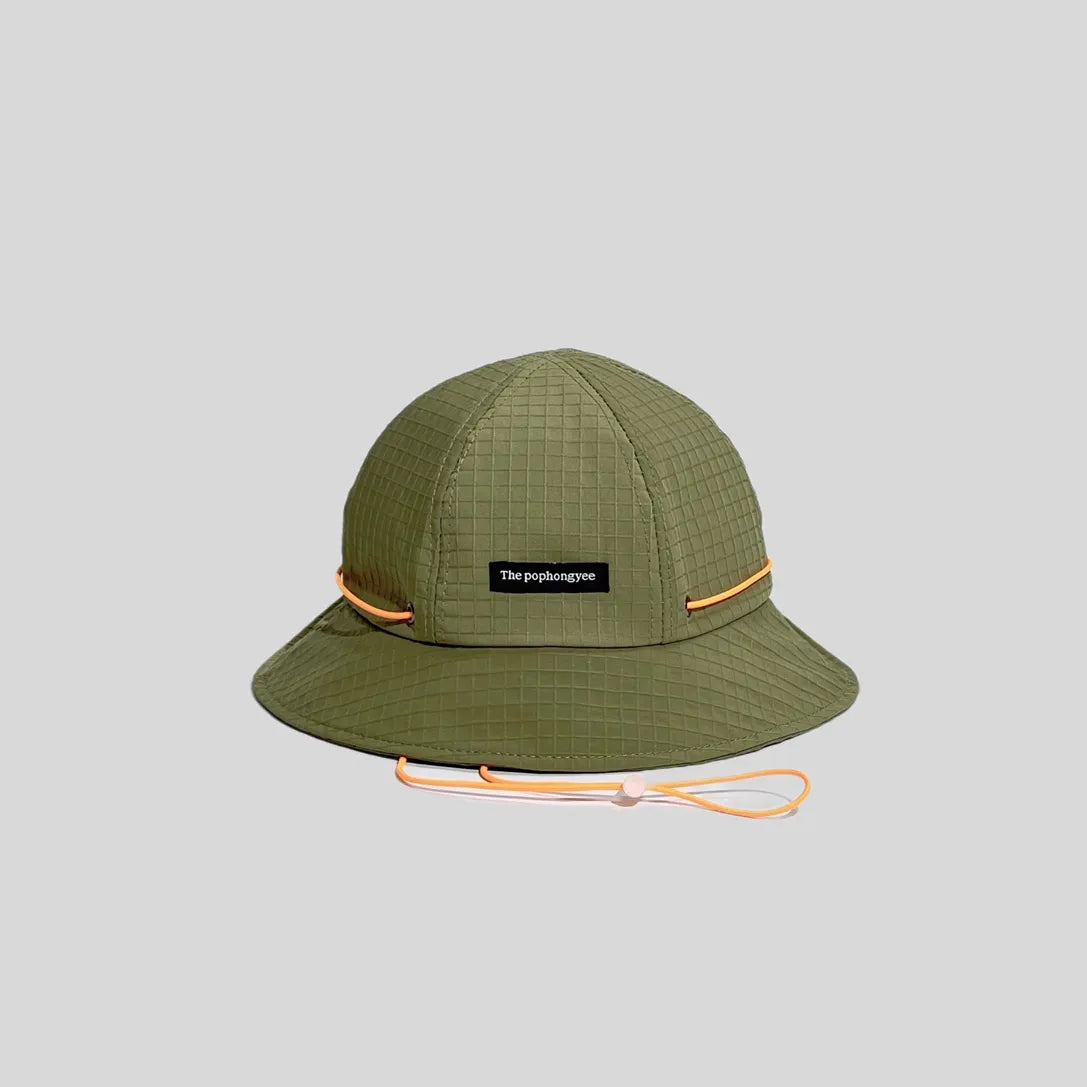 Quick-dry bucket hat in olive green with an orange cord, front view showing the logo tab, grid weave and wide brim