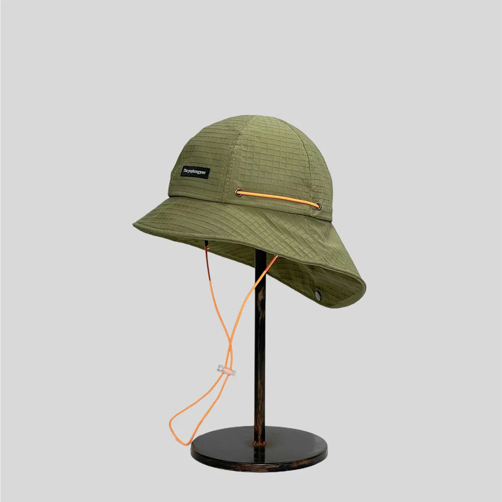 Quick-dry hiking hat in olive green, side display showing the wide sloping brim, orange cord and grid texture