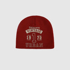 Red acrylic cuffless beanie with vintage number graphic and classic streetwear lettering