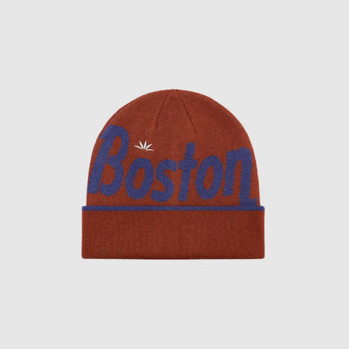 Rust red acrylic beanie hat with bold Boston lettering and folded cuff design