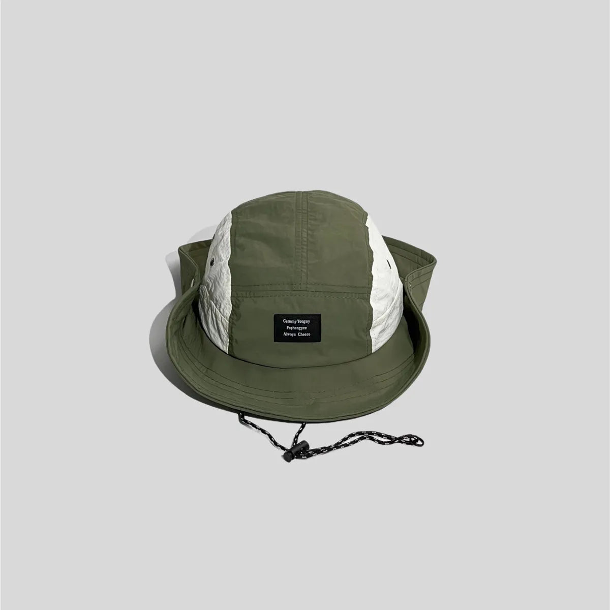 Olive green snap-up boonie hat with white eyelet panels, raised brim sides, front patch and black chin cord.