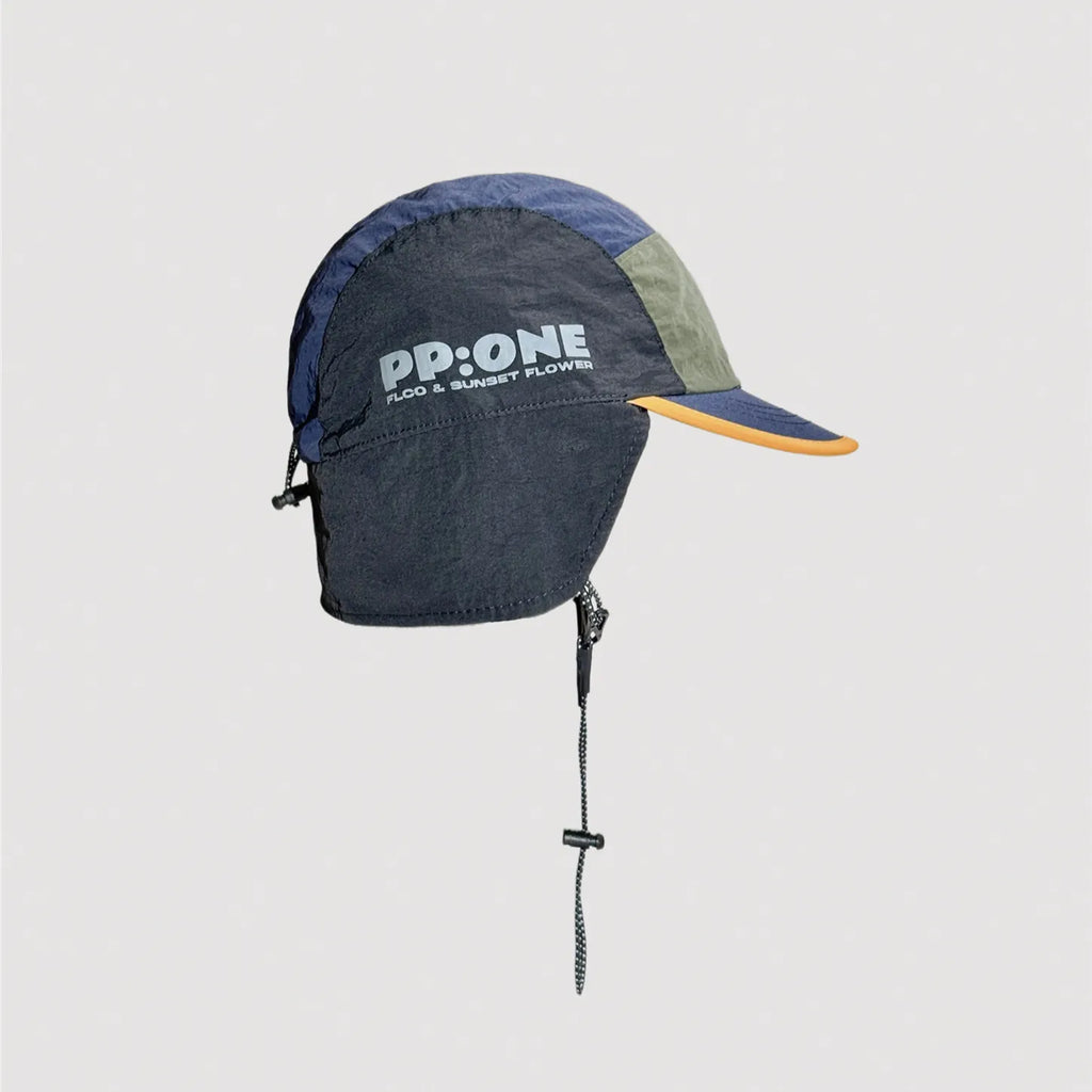 Navy nylon outdoor ear cover hat with adjustable chin cord and modern design