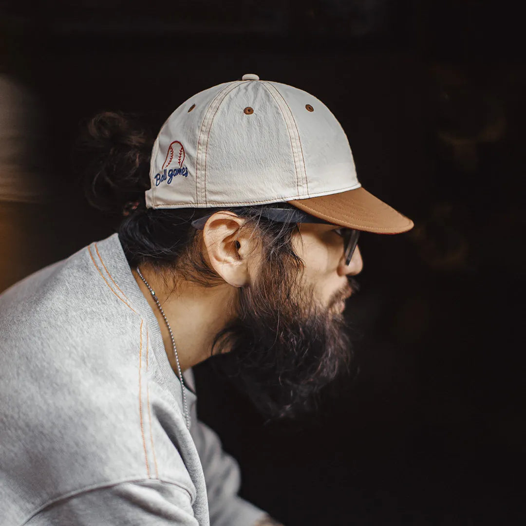 Low profile unstructured dad cap made with lightweight polyester fabric
