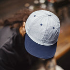 Vintage dad cap worn with casual streetwear outfit featuring classic baseball silhouette