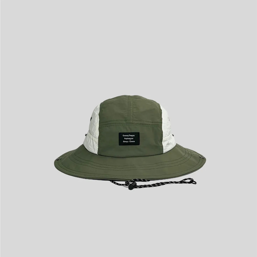 Olive green wide-brim sun hat with white side panels, front patch label, stitched brim and metal snap fasteners.